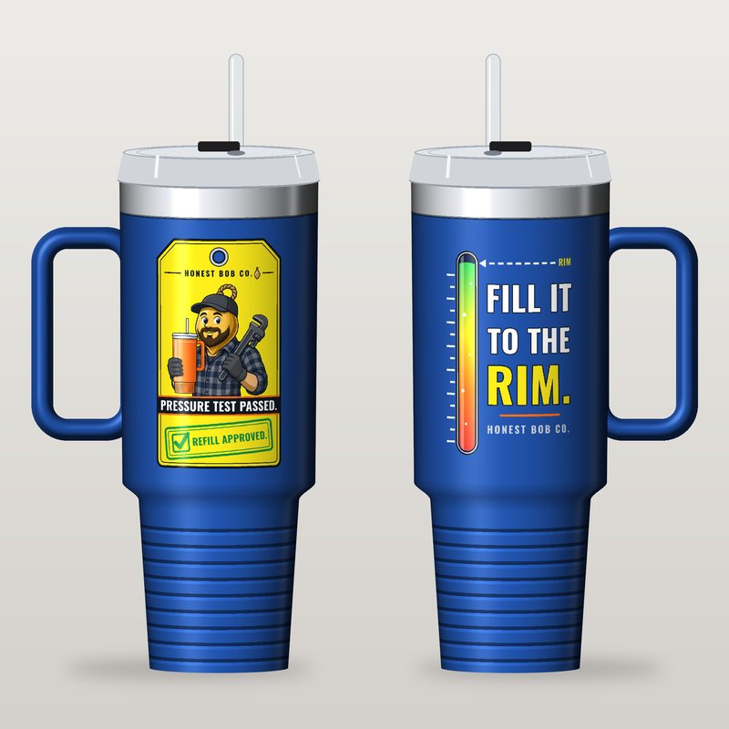 Simulated preview, not a photo: royal blue 40 oz travel mug with Rugged Bob on a yellow inspection tag reading Pressure Test Passed. Refill Approved., and Fill It to the Rim. on the other side